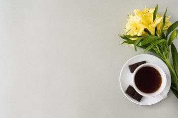 background for text with a cup of coffee and flower