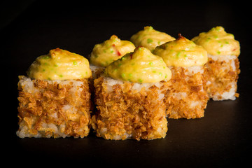 closeup baked roll with smoked chicken and cheese sauce