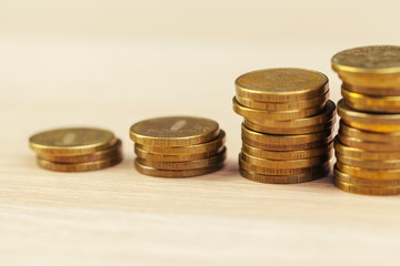 piles of coins on working table
