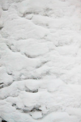 Winter fluted fluffy snow texture 