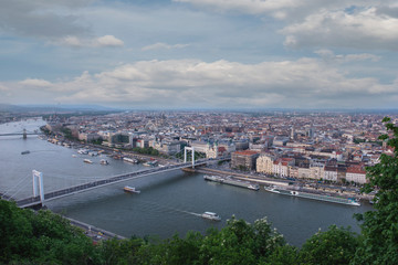 Fototapeta premium Budapest is the capital of Hungary.Beautiful big old town.The magnificent city is rich in history.The photo is made on a sunny day.City landscape with a wide large river.Beautiful buildings.Landscape.