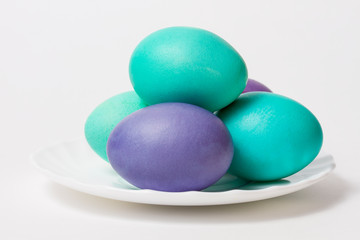 colored eggs on a white background. Easter tradition.