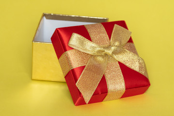 Gift box on yellow background