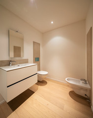Modern marble bathroom with spotlights