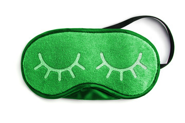 Green sleeping eye mask, isolated on white background