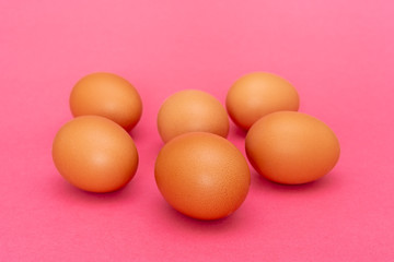 Six brown eggs