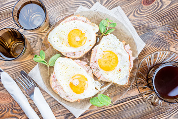 Breakfast. Toast with the finest meat and fried egg.