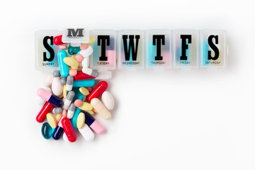 Pharmaceutical Drugs Pouring Out Of Pill Box Flatlay