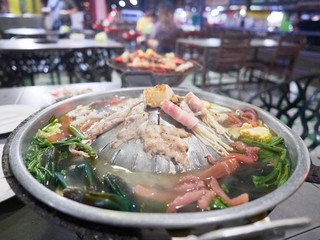 Assorted meat and vegetable on Thailand style hot pot, mookata.