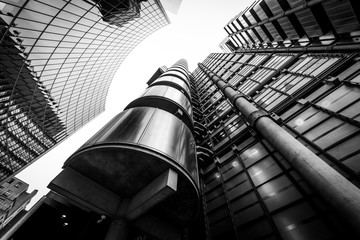 Low angle view of skyscrapers. Looking up perspective. Bottom view of modern skyscrapers in business district. Business concept of success industry