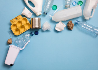 Top view of rubbish for recycling on a blue background