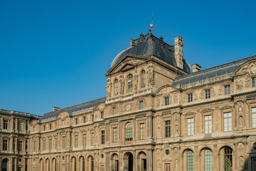 Fototapeta na wymiar Exterior view of the famous Louvre Museum at Paris