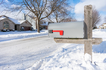 A Home Mailbox buried in Snow after a Snowstorm 