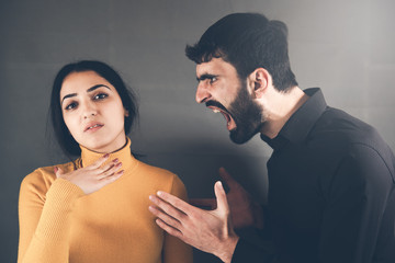 angry man and sad woman