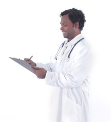 General practitioner writing a prescription for a patient