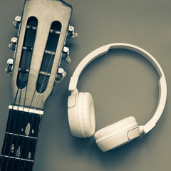 Wireless headphone with guitar. authentic design music cover.