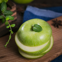 Set of green fruits for healthy diet and detox: apple, lime, kiwi, mango, carambola and mint.
