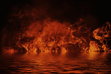 Texture of fire with reflection in water. Flames on isolated black background. Texture for banner,flyer,card .