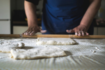 Old woman making a pie by her recipe