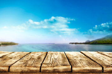 Fototapeta premium Table background of free space and summer landscapre of sea and sky 