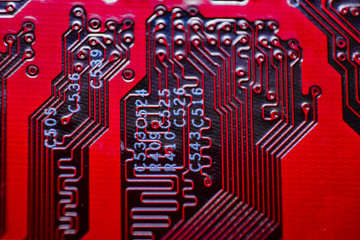 View from underside of a circuit board electronic. Computer hardware and things of Information...