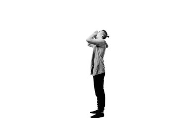 stylish man shows hands up gesture shouting out loud on white background