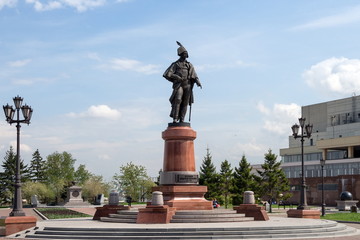Monument to statesman N.P. Rezanov (1799-1881) on the square in front of the Great Concert Hall in the city of Krasnoyarsk in springtime. Krasnoyarsk region. Russia.