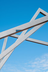Steel construction on the blue sky background