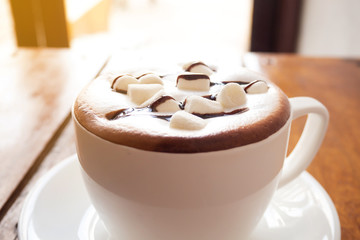 Marshmallows on top of hot chocolate. Sweet beverage. Hi nutrition.