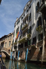 Fototapeta na wymiar Beautiful Venetian Style Palaces Seen Walking On Gondola In Venice. Travel, holidays, architecture. March 29, 2015. Venice, Veneto region, Italy.