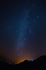 night sky stars milky way on mountains background