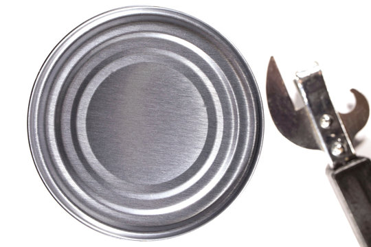 tin can and bottle opener on white background