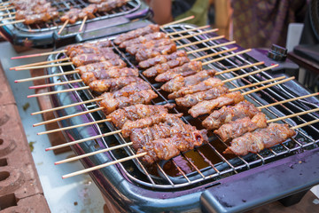 Barbecue, grill and food concept.Beef steaks on the grill with flame.