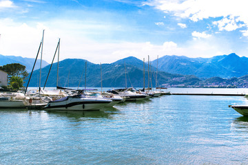 Beautiful view of the coast of Italy. Beautiful view from the boats at the shore. Lake with boats along the coast of Italy.