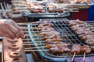 Barbecue, grill and food concept.Beef steaks on the grill with flame.