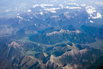 Aerial view of Alps mountains seen from an airplane