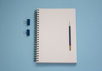 notepad on a blue background