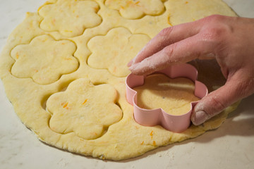 Baker making the cookies.