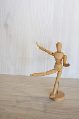 wooden dummy on a light background