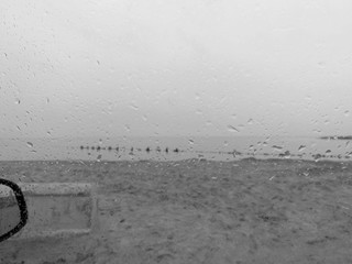 Shore through the glass of the car