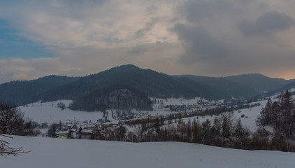 Fototapeta na wymiar Hrencisov village near Lipany town in winter mountains