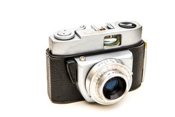 A picture of an old vintage mechanic camera isolated on a white background.