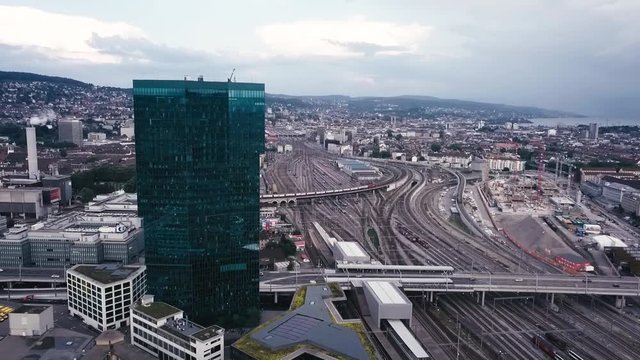 aerial city view around skyscraper and train track