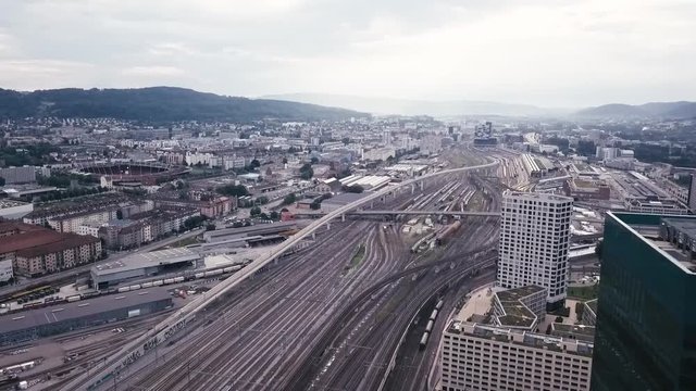 aerial city view around skyscraper and train track