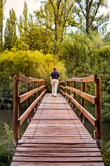 Beautiful bridge that crosses the river in full nature.