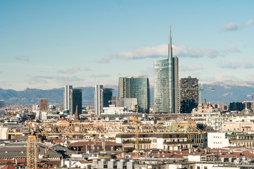Fototapeta na wymiar Milan (Italy) skyline with new skyscrapers in Porta Nuova business district. Panoramic view of Milano city. Italian landscape.
