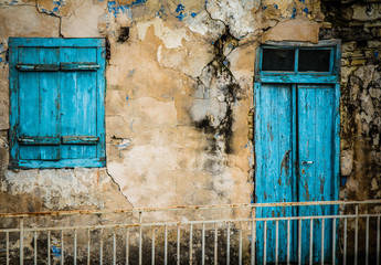 An old village blue door and window.