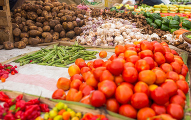 tomatoes and other vegetables on local market in Zanzibar