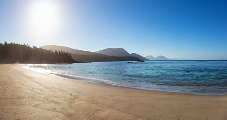 Beautiful sandy beach on the Pacific Ocean during a sunny summer morning. Taken in Grant Bay Beach, Northern Vancouver Island, BC, Canada.