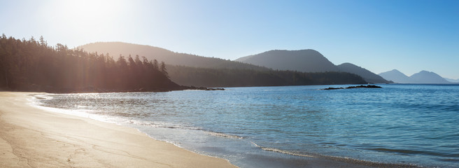 Beautiful sandy beach on the Pacific Ocean during a sunny summer morning. Taken in Grant Bay Beach, Northern Vancouver Island, BC, Canada.